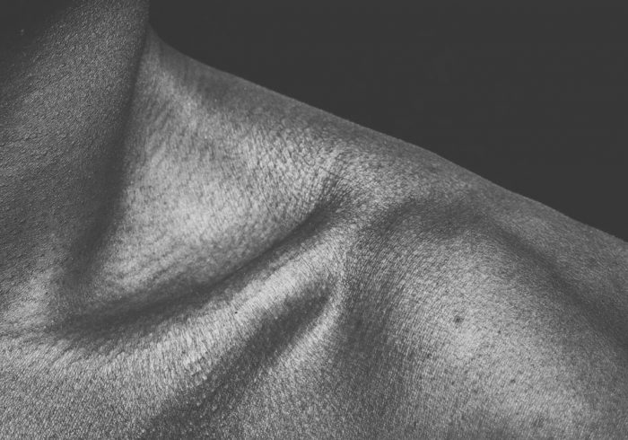 black textile in grayscale photography
